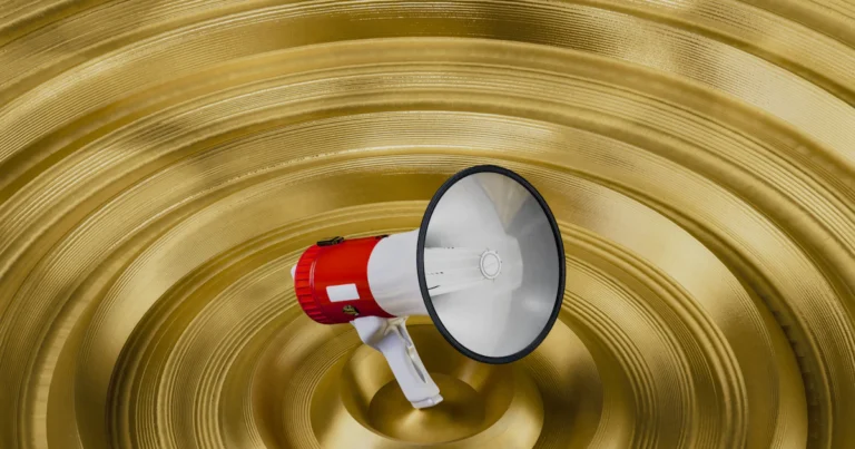 Red and white megaphone, for getting exposure with articles and press releases