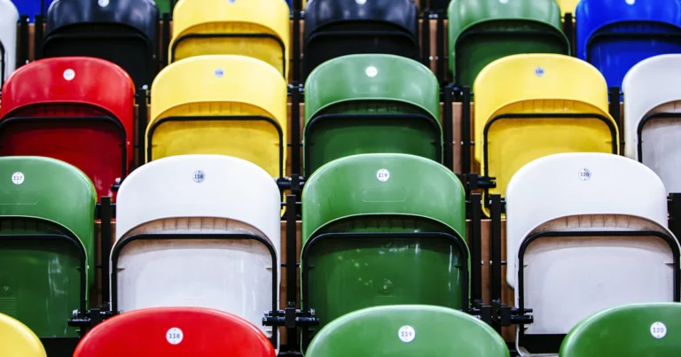 Rows of empty colourful seats, like bought followers who never engage