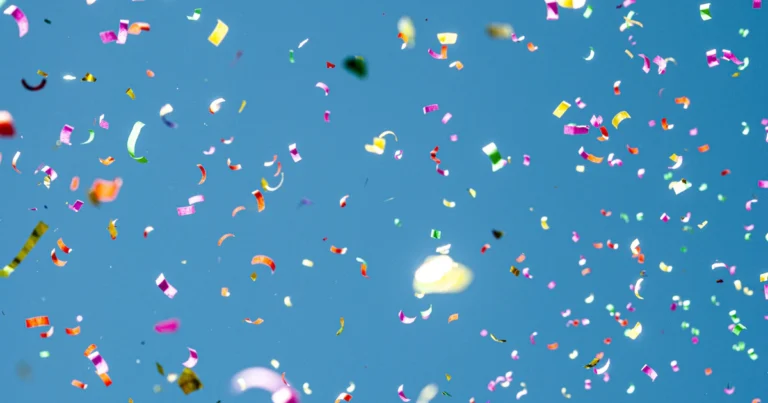Colourful confetti against a blue sky, for Google's April Fools pranks