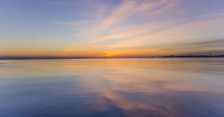 How to factory reset Windows 11: a fresh start at sunrise over the water