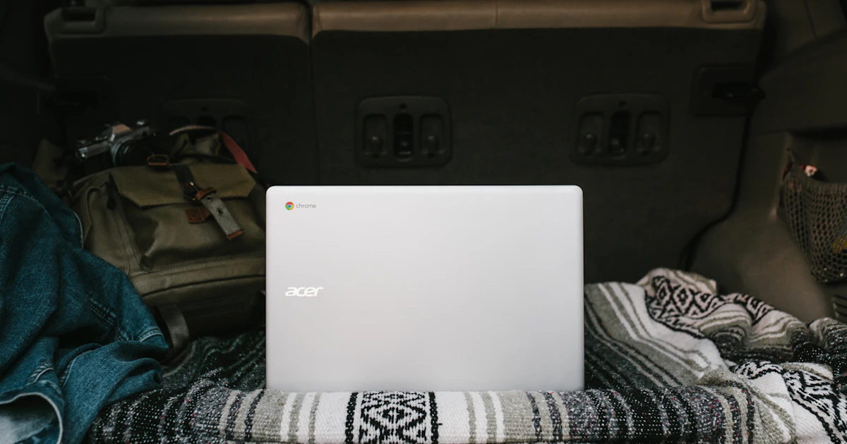 Chromebook laptop open on a desk, ready to take a screenshot