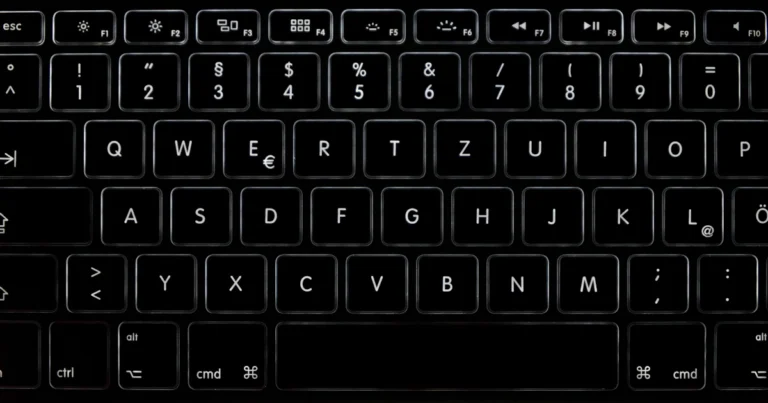 Dark Mac keyboard used to type the copyright symbol with Option + G