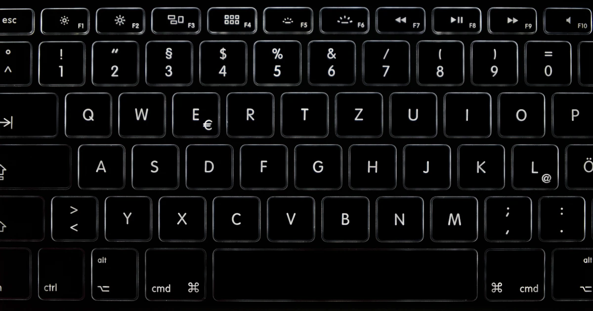 Dark Mac keyboard used to type the copyright symbol with Option + G