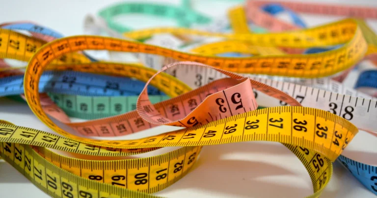 Colorful tape measures for measuring X marketing success